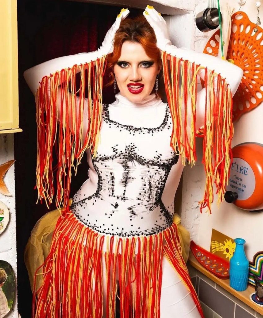 CMAT in custom performance outfit by Oran O'Reilly, picture for DIY Magazine